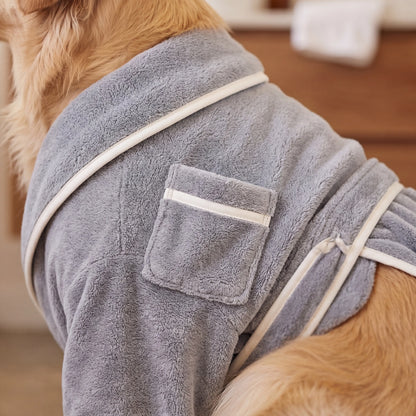 Close-up of the Sleekpaw bathrobe soft microfiber, cream trim, collar and pocket on a dog