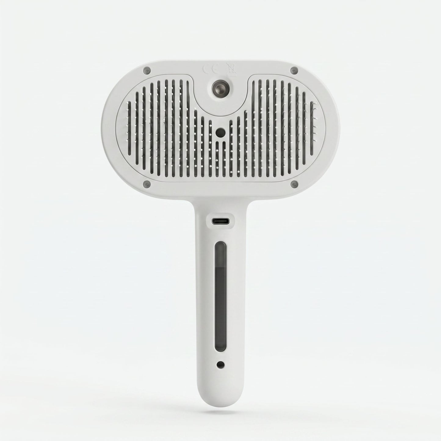 Sleekpaw comb bristle face: ball-tip pins through the slotted self-clean plate, built-in mist nozzle at top