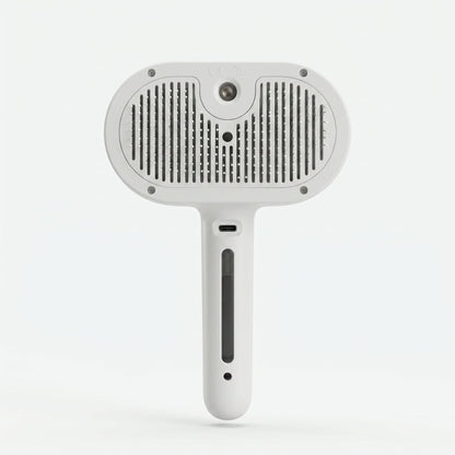 Sleekpaw comb bristle face: ball-tip pins through the slotted self-clean plate, built-in mist nozzle at top