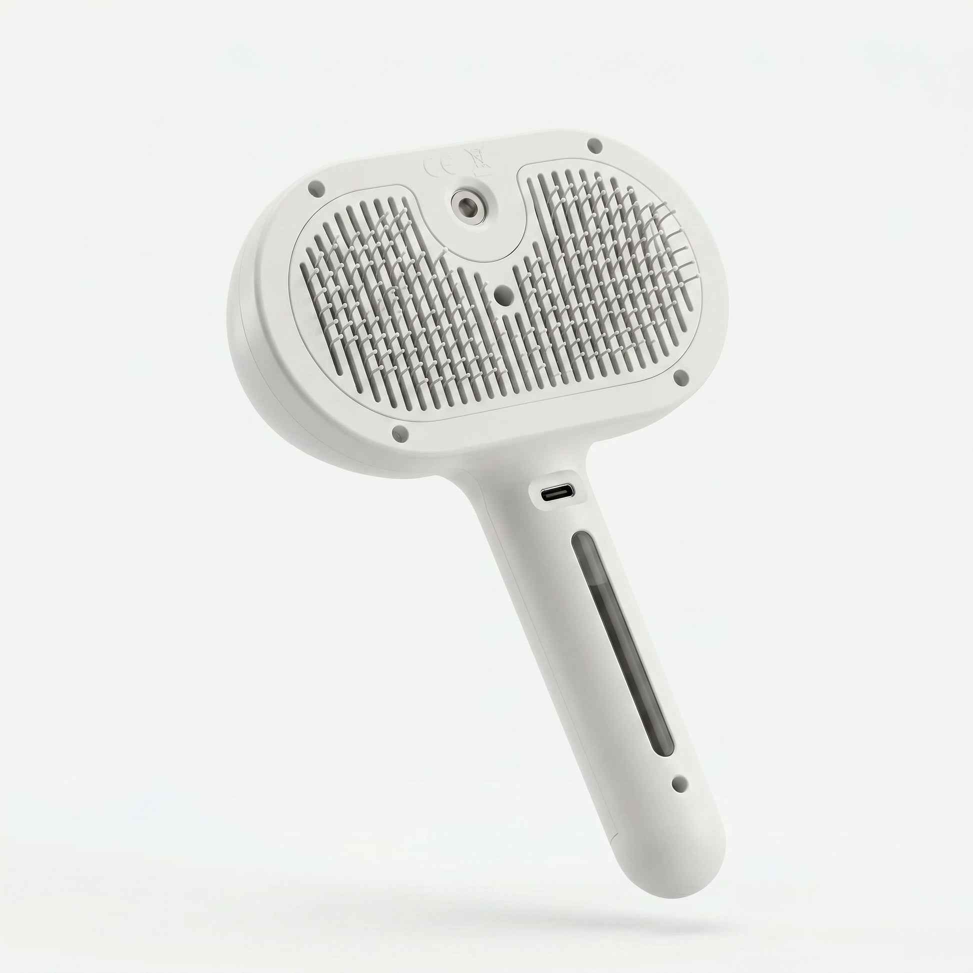Rear view of the Sleekpaw comb showing the USB-C charging port and water tank window on the handle