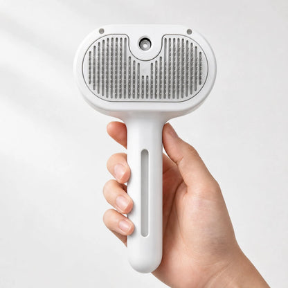The Sleekpaw comb held upright in one hand, bristle face forward, at true size